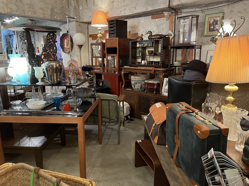 PONOPONO store interior with furniture, glassware, lamps and luggage